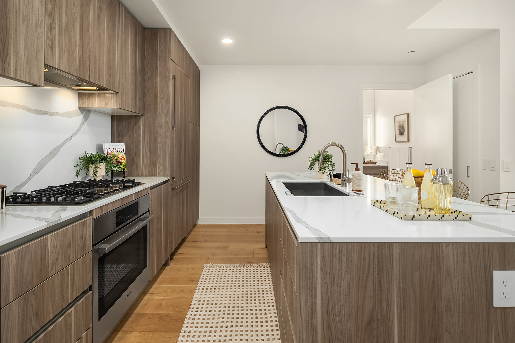 Galley view of the kitchen with integrated appliances