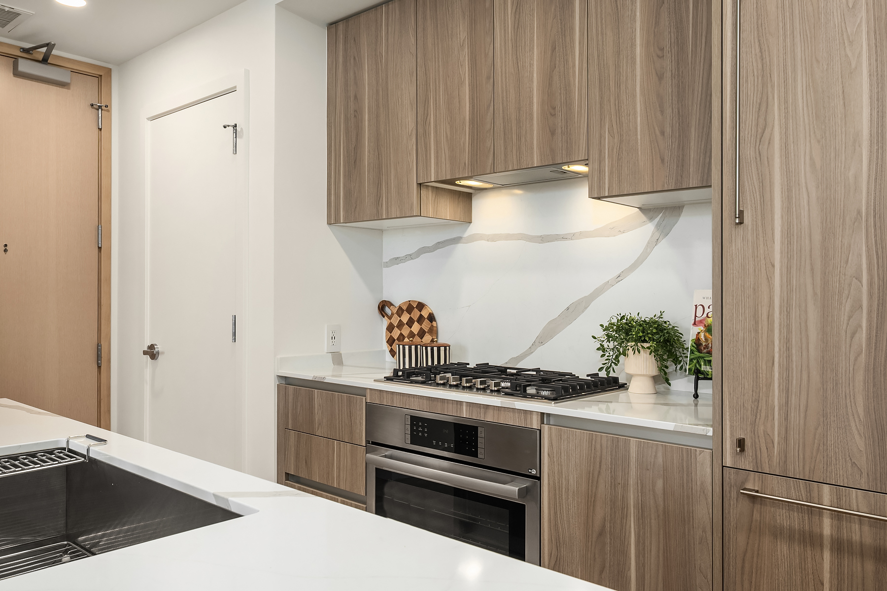 Gas cooktop and stone backsplash detail