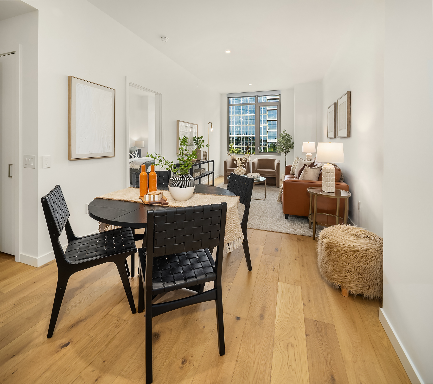 Dining nook with wide-plank wood floors