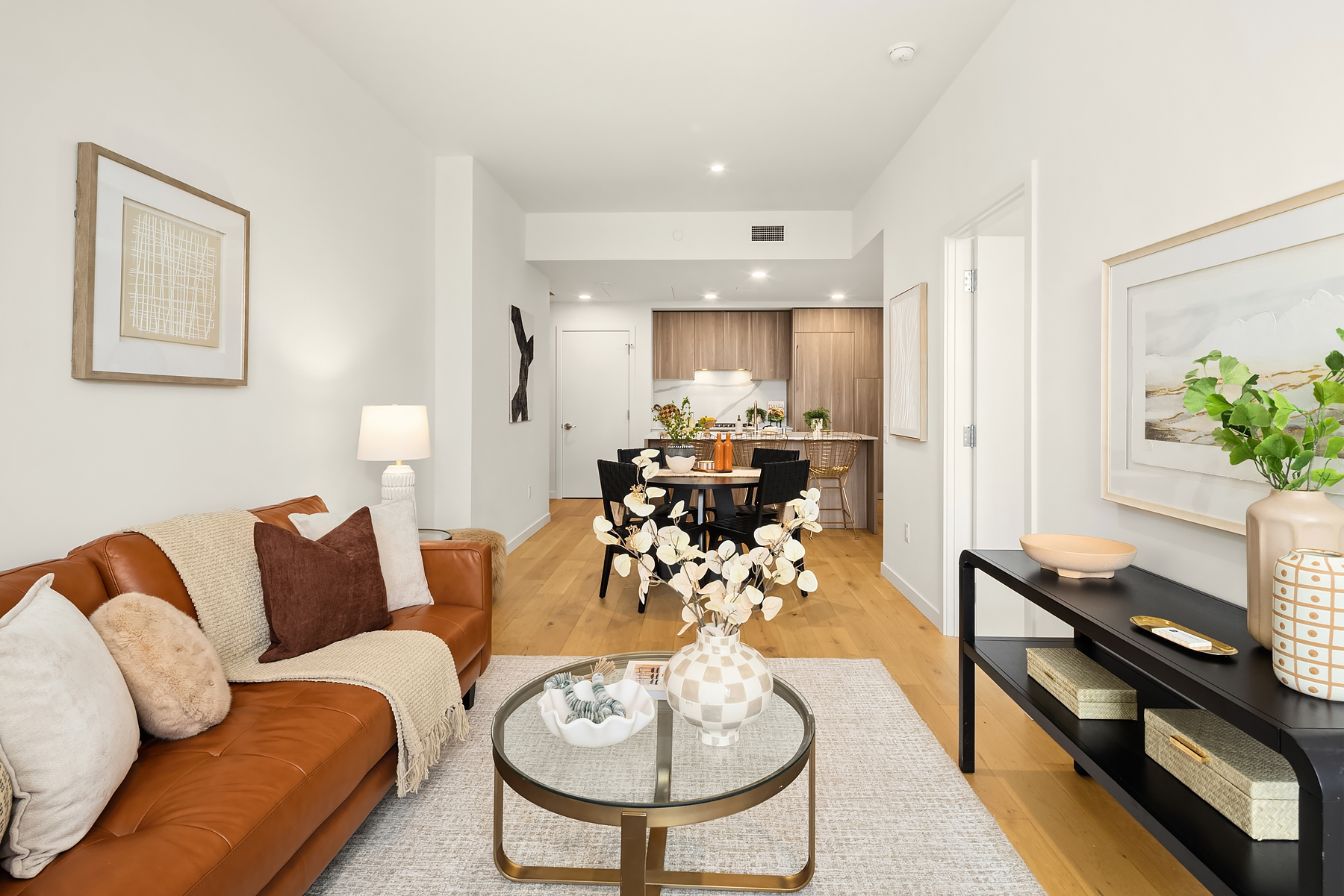 Living space flowing into the dining area and kitchen