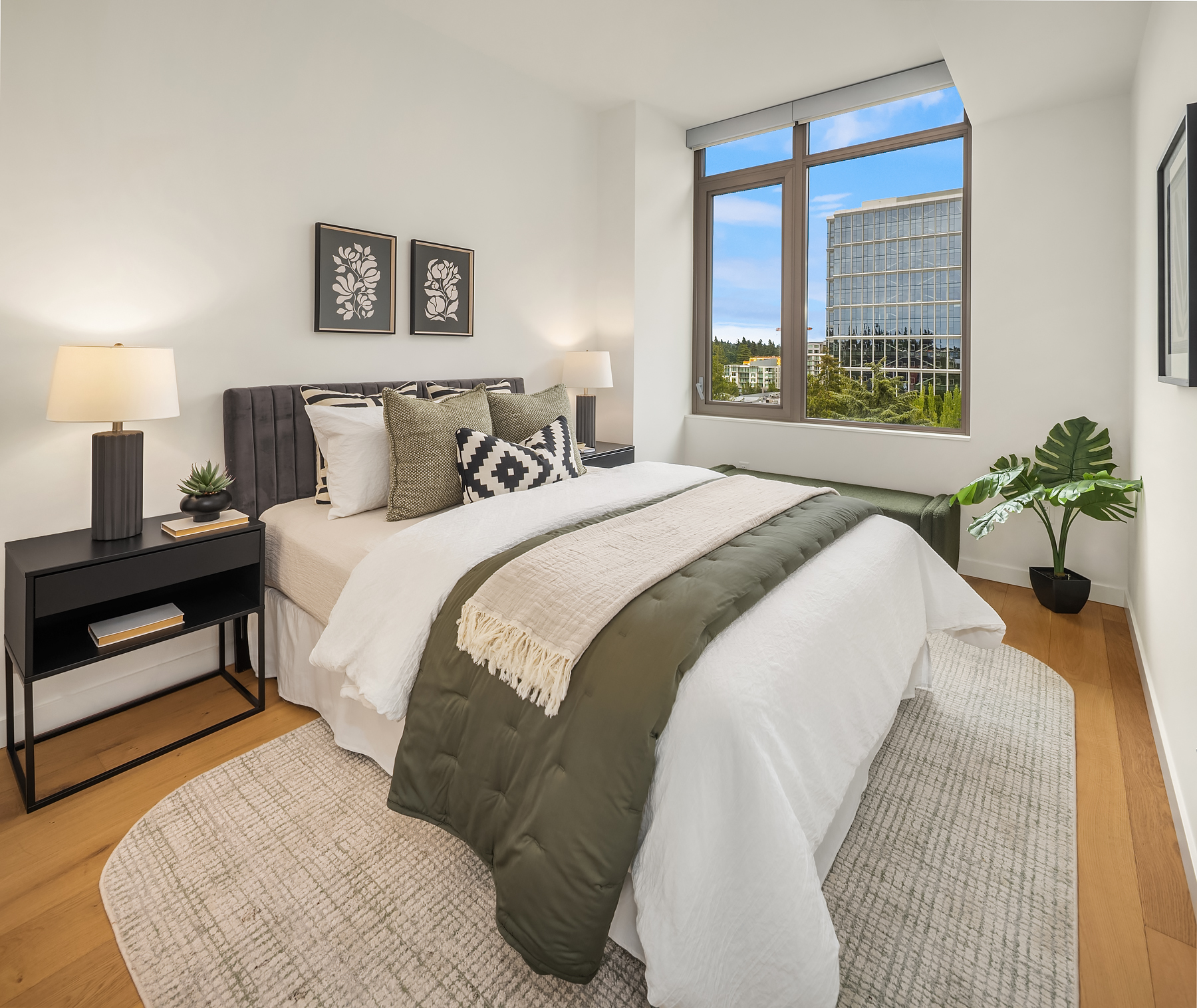 Bedroom with oversized window and designer staging