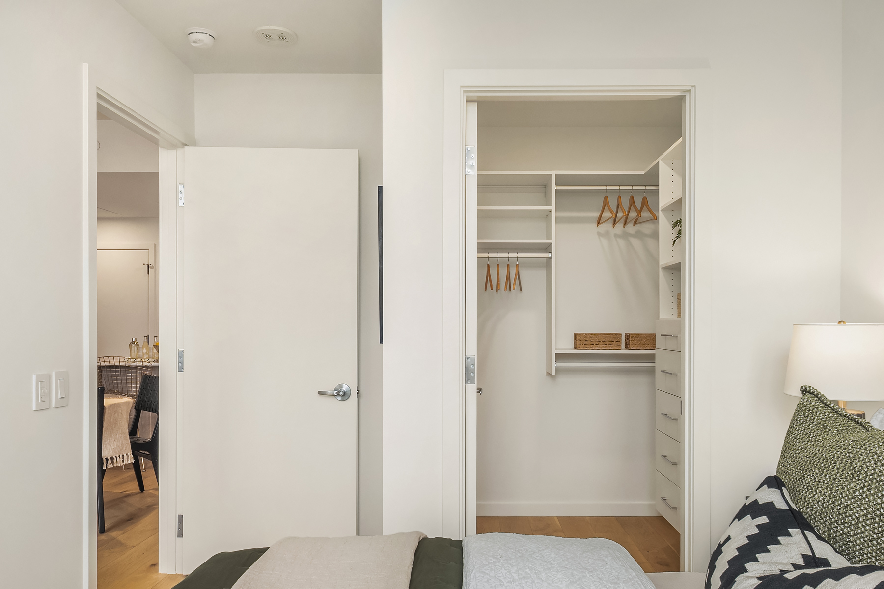 Fitted walk-in closet off the bedroom