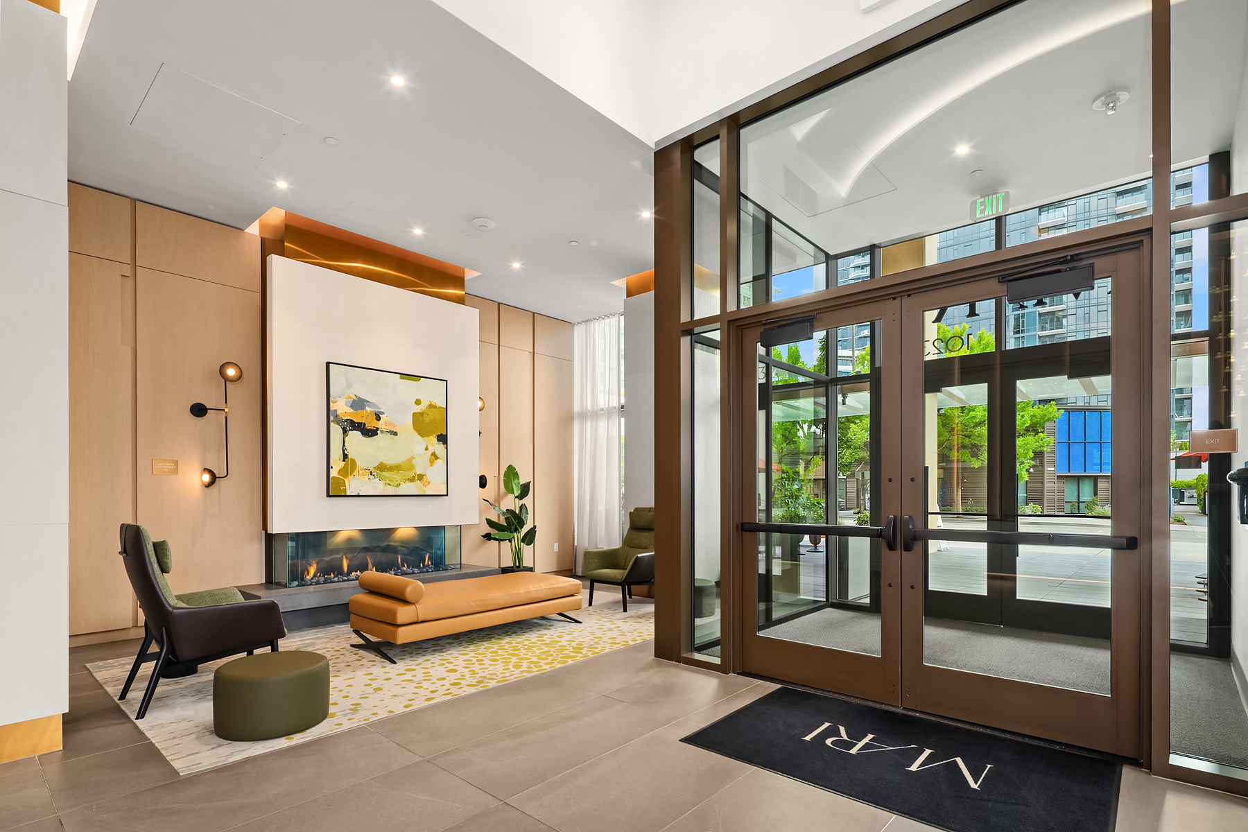Lobby entry with concierge and designer furnishings